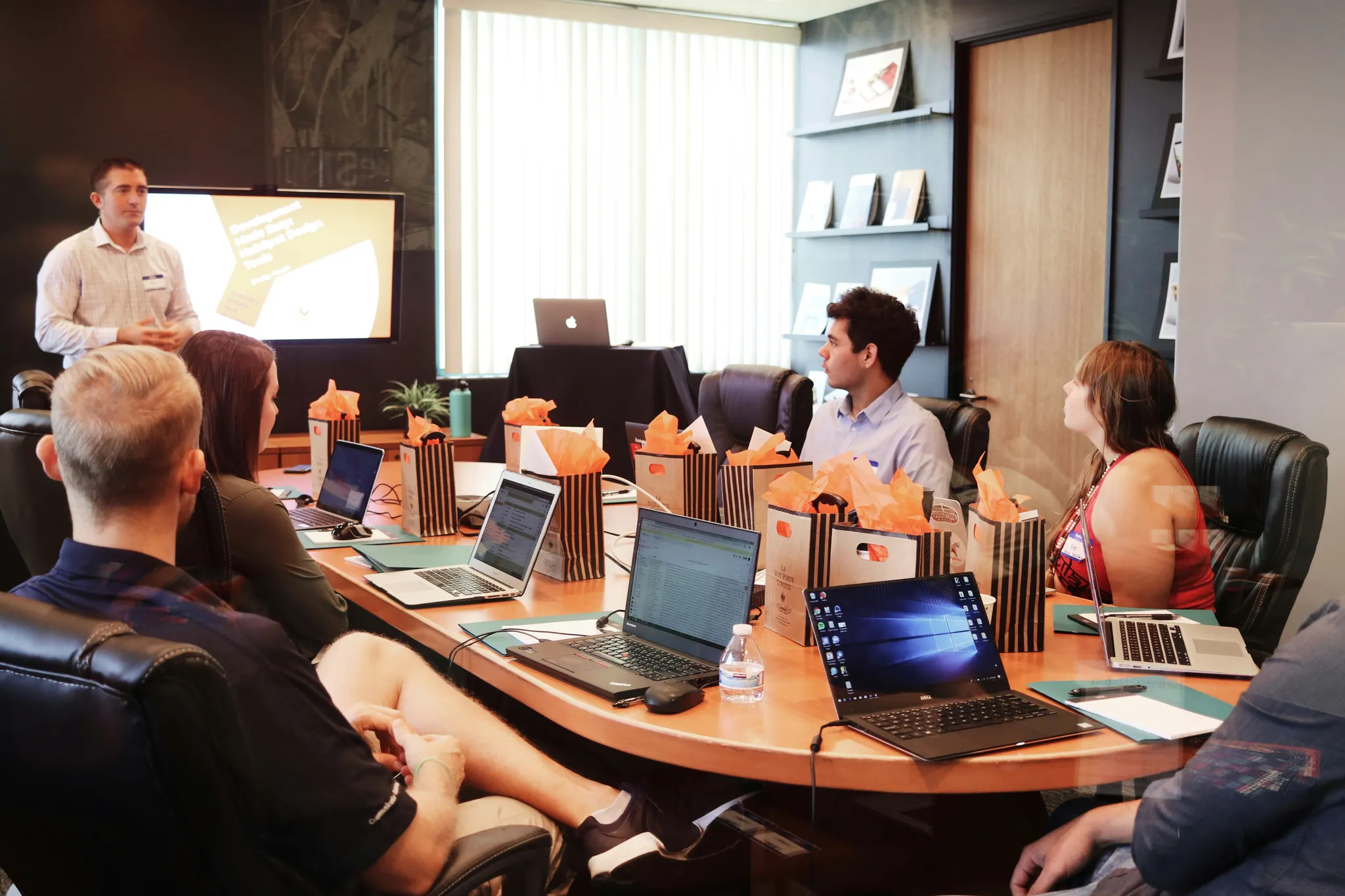 The Blooming Nest Realty team in a client meeting